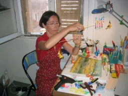 Personnalisation d'un mobile artisanal, cadeau de naissance unique